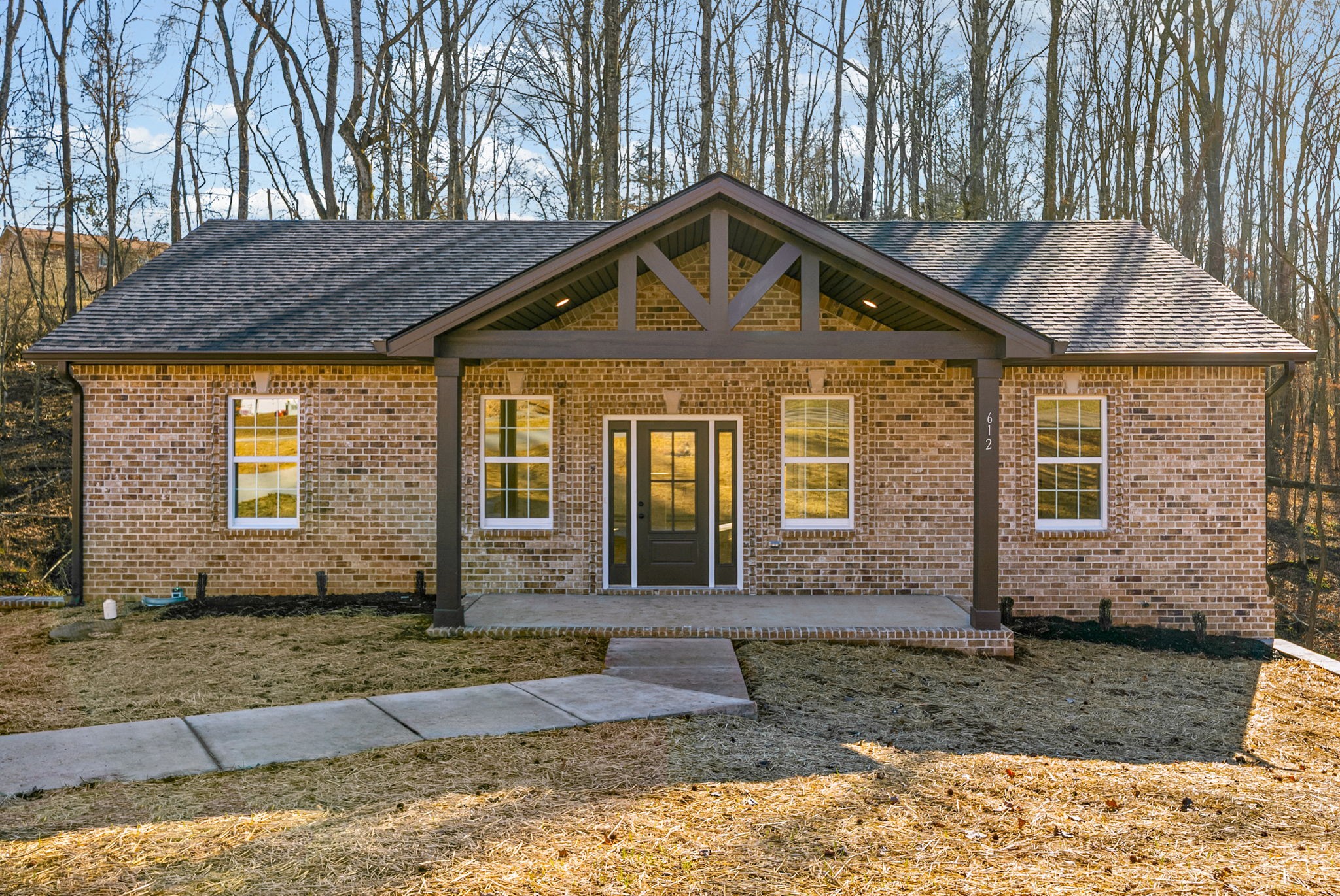 612 Hill Road Clarksville, TN 37040 - Photo 4 of 44 a front view of a house with garden