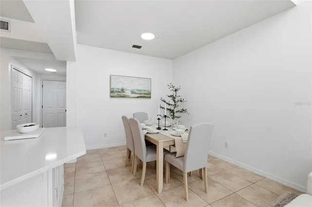 a kitchen with a sink stainless steel appliances and cabinets