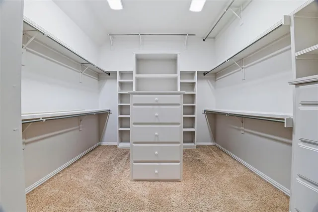 a view of an empty walk in closet