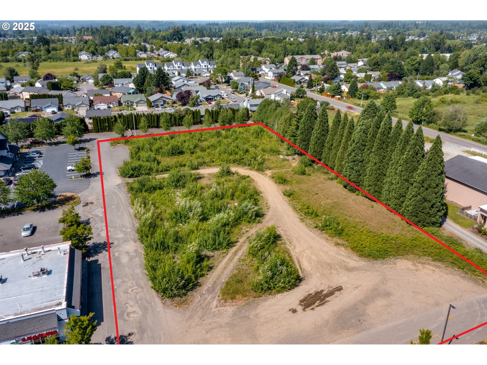 0 Northwest 2nd Street, Unit 2 & 3 Battle Ground, WA 98604 - Photo 6 of 14 an aerial view of residential houses with outdoor space
