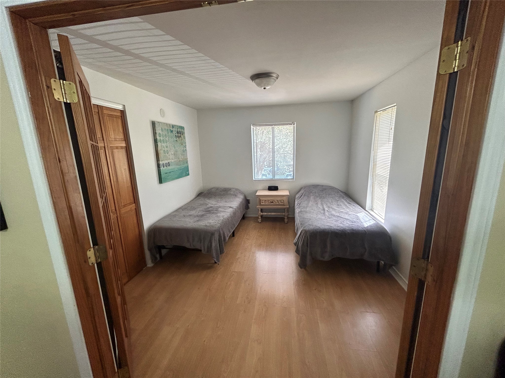 4812 Avenue G, Unit B Austin, TX 78751 - Photo 3 of 13 a bedroom with a bed and a window