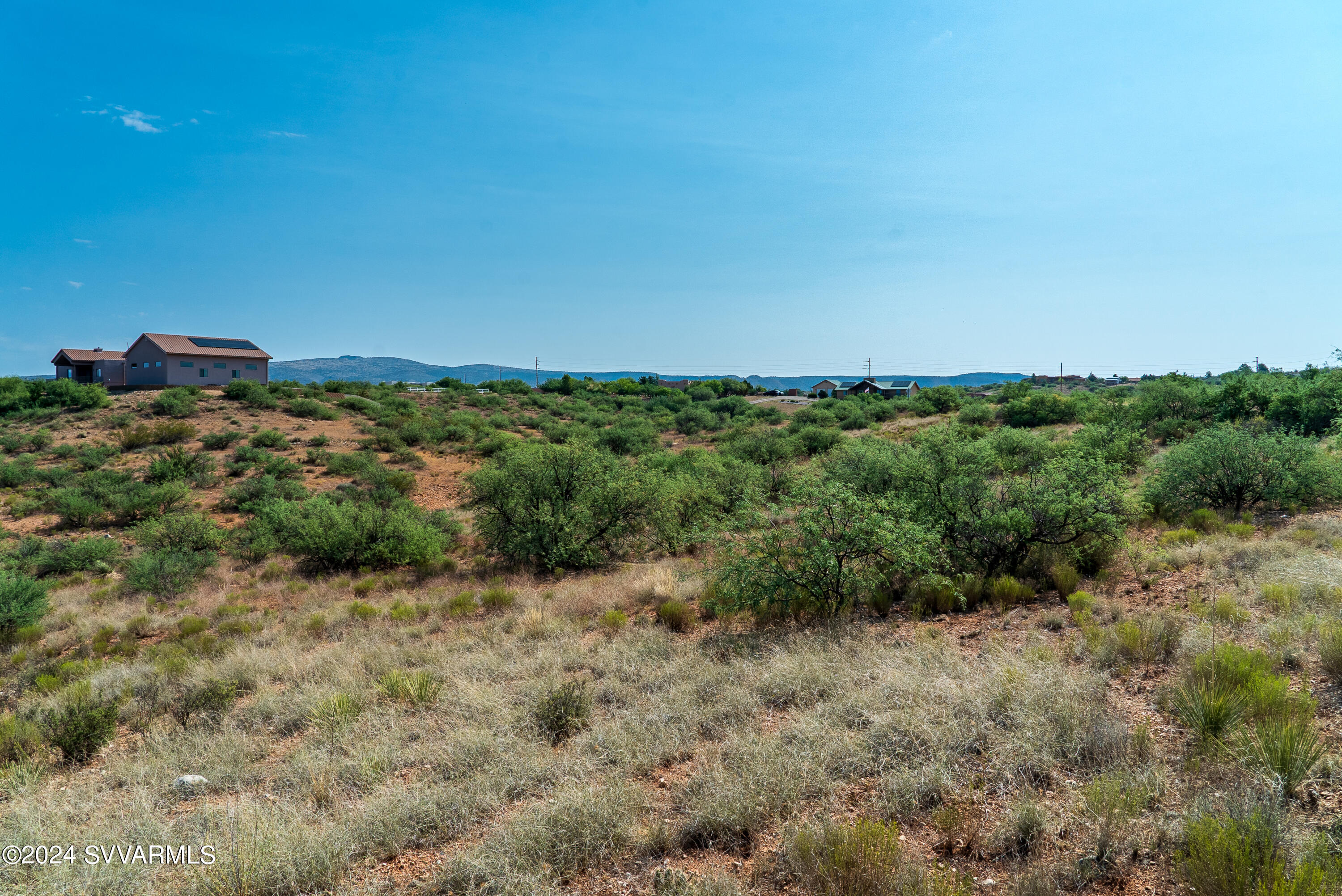 1600 South Aspaas Road Cornville, AZ 86325 - Photo 13 of 19 a view of a green field with lots of bushes