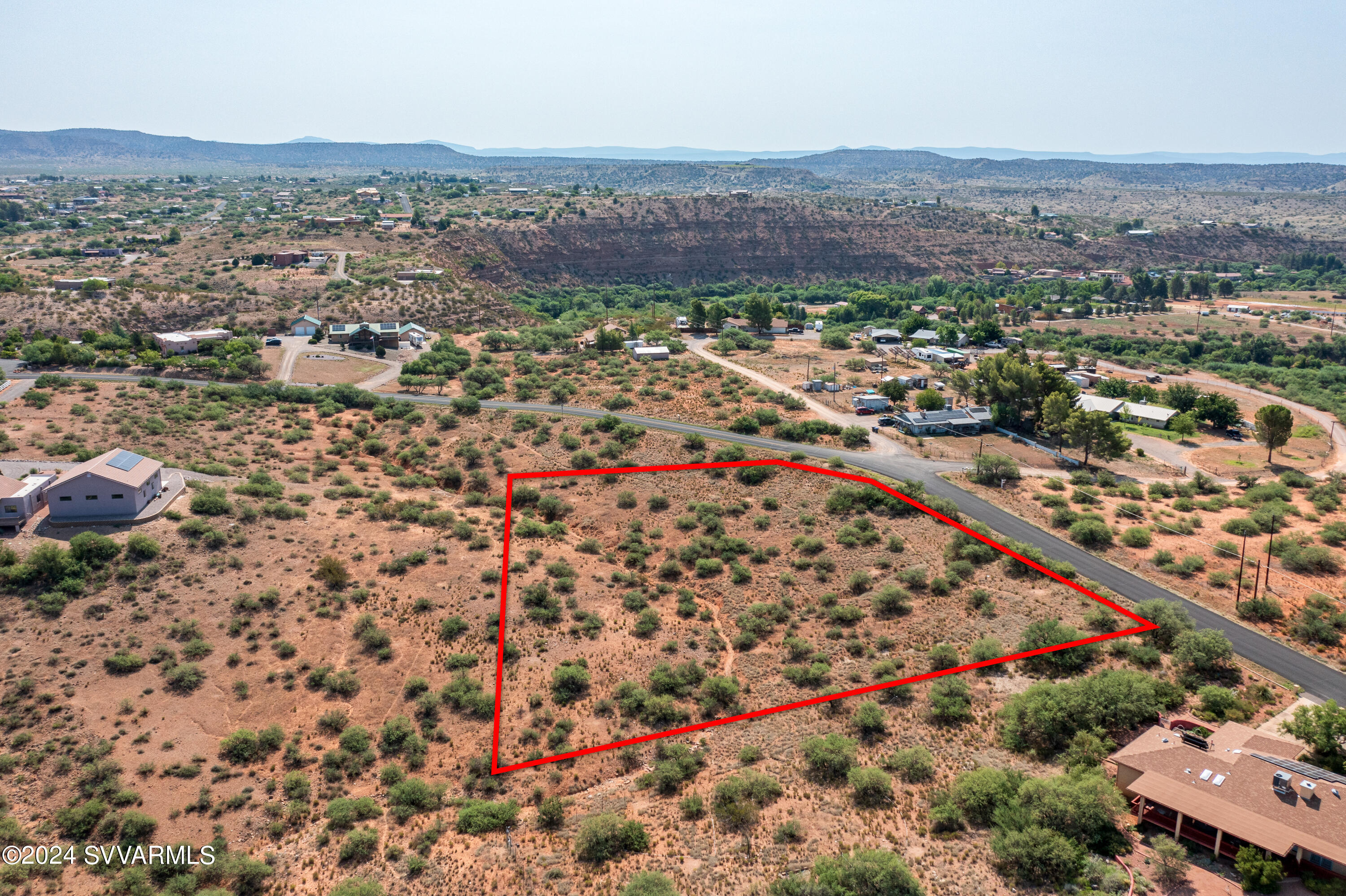 1600 South Aspaas Road Cornville, AZ 86325 - Photo 17 of 19 an aerial view of house with yard and mountain view in back