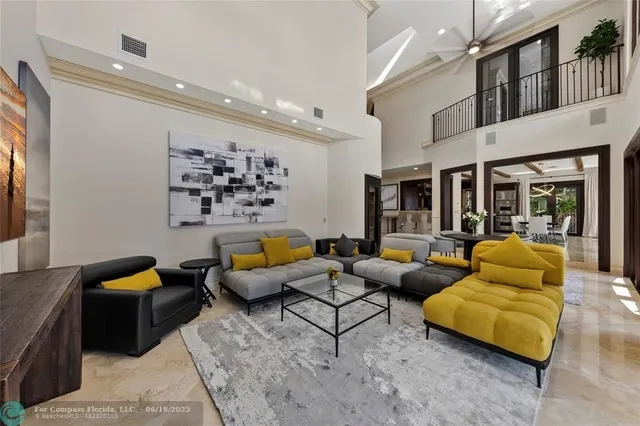 a view of a patio with table and chairs and potted plants