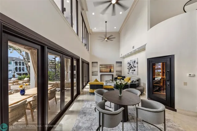 a spacious bedroom with a large bed and a large window