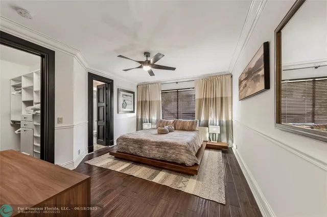 a kitchen with a granite countertop sink a stove and a window