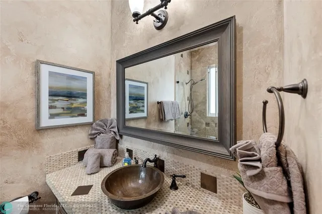 a view of a backyard with a swimming pool