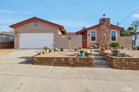 a front view of a house with entertaining space