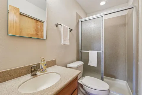 a outdoor space with patio the couches and a dining table with chairs