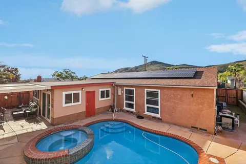 an aerial view of residential building with parking space