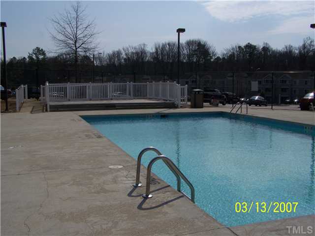 1241 University Court, Unit 304 Raleigh, NC 27606 - Photo 3 of 4 a view of swimming pool with a yard