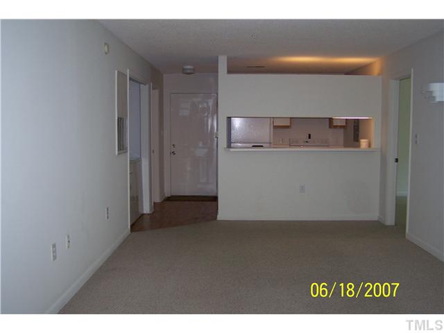1241 University Court, Unit 304 Raleigh, NC 27606 - Photo 4 of 4 a view of kitchen and an empty room
