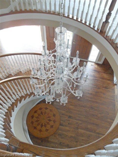 4793 Crestone Way Rochester, MI 48306 - Photo 11 of 20 Spiral Staircase