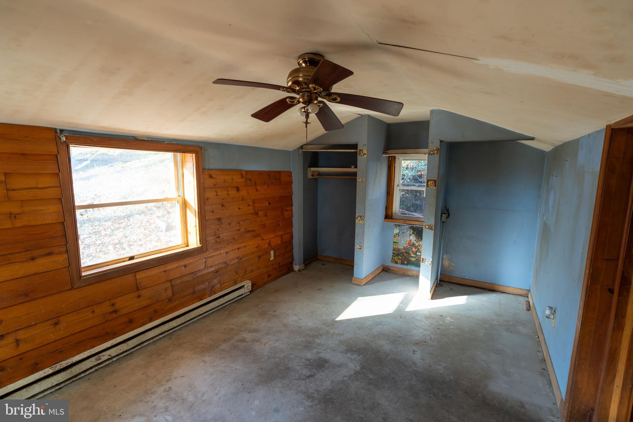 142 River Road Pequea, PA 17565 - Photo 11 of 35 a view of a livingroom with a ceiling fan and window