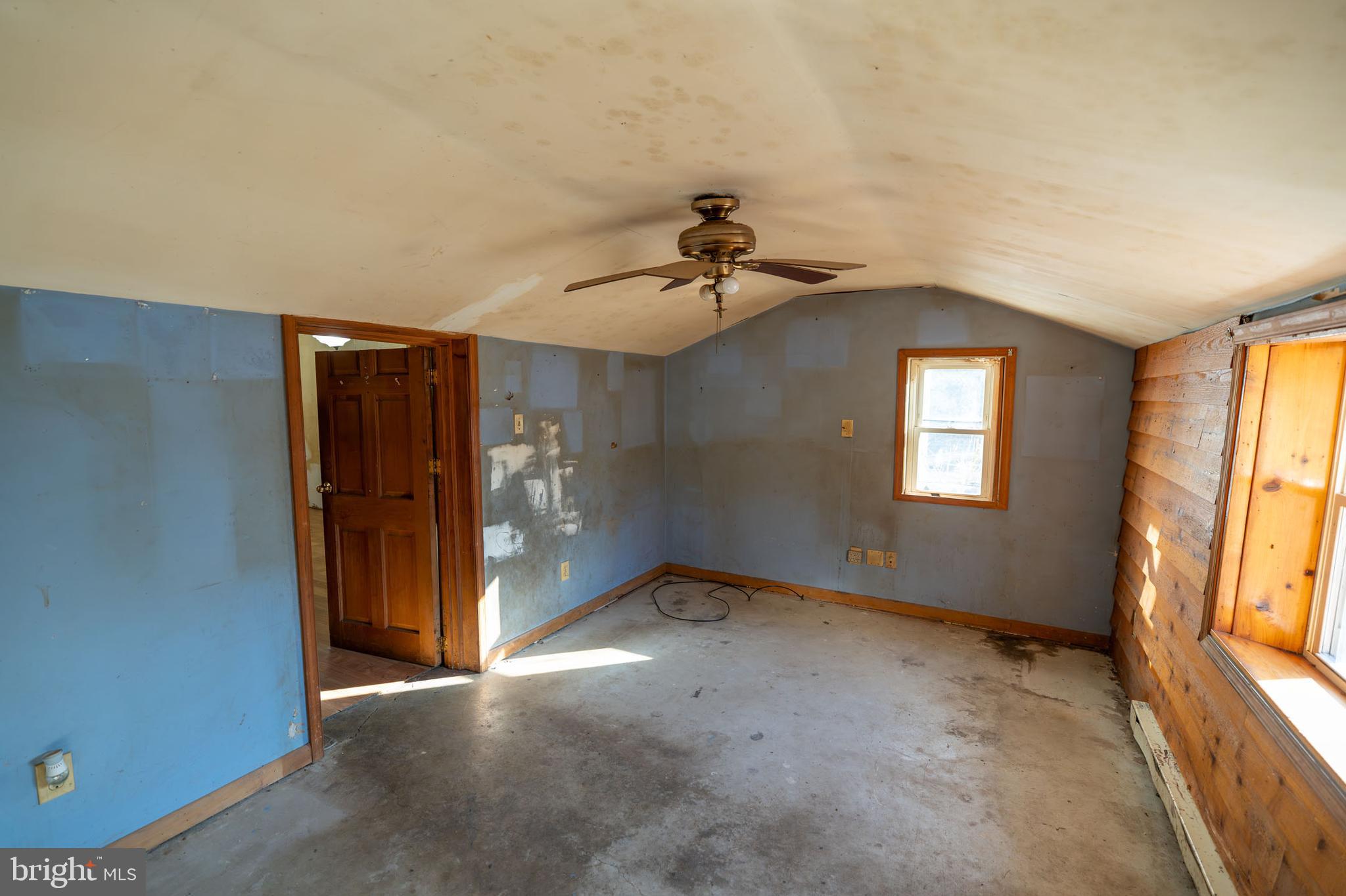 142 River Road Pequea, PA 17565 - Photo 12 of 35 an empty room with windows and entrance