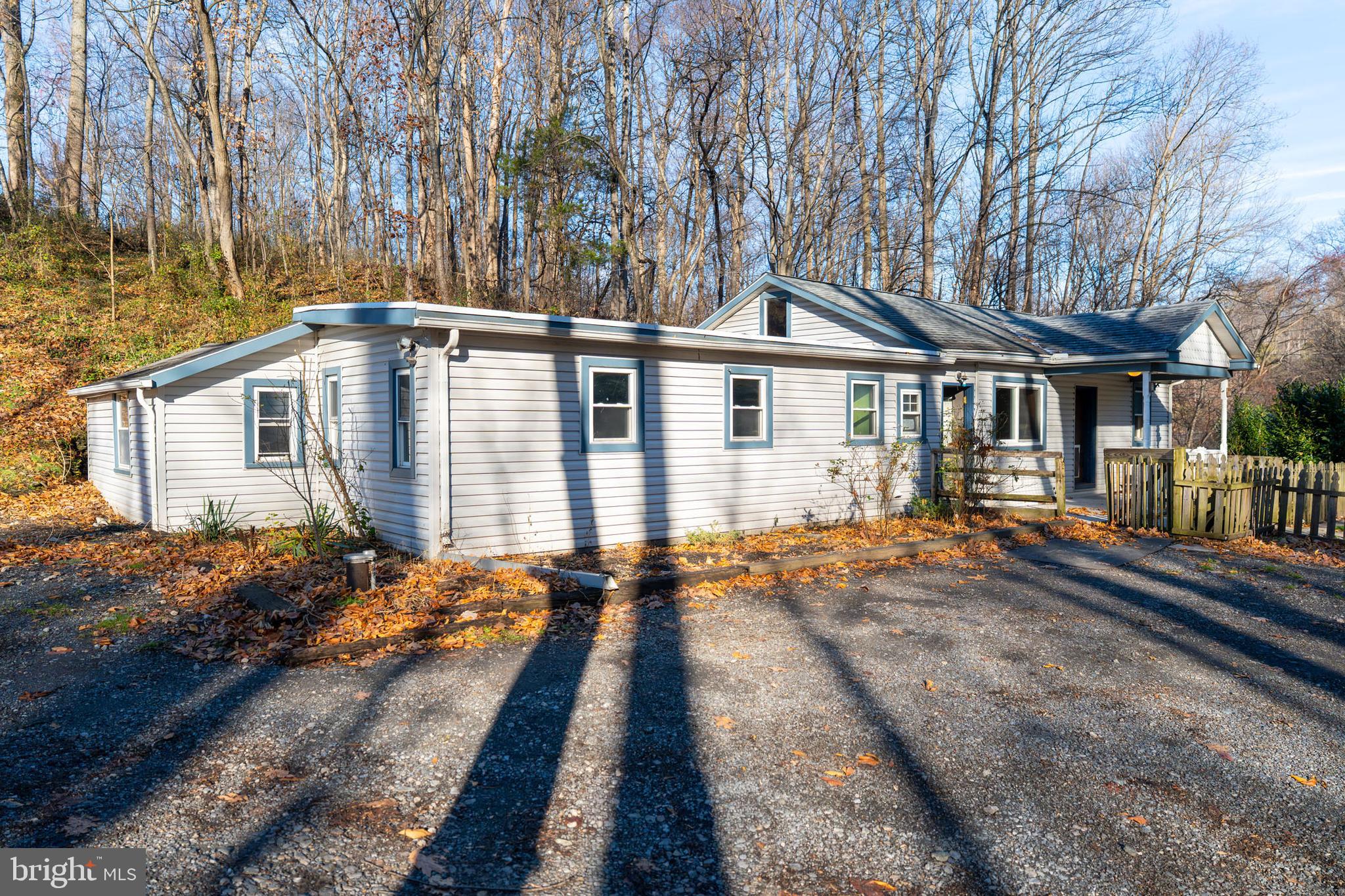 142 River Road Pequea, PA 17565 - Photo 6 of 35 a view of a house with a wooden floor and a yard with the trees