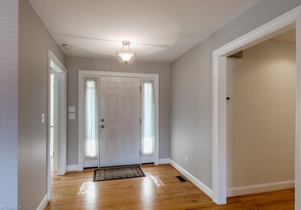 8315 Dennis Road Walnut Cove, NC 27052 - Photo 13 of 30 Open Foyer w/Natural Lighting and Hardwood Floors