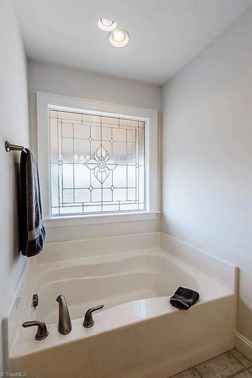 8315 Dennis Road Walnut Cove, NC 27052 - Photo 22 of 30 Beautifully Designed Window Above Garden Tub
