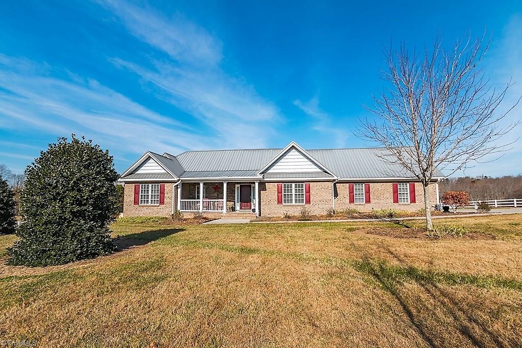 8315 Dennis Road Walnut Cove, NC 27052 - Photo 5 of 30 Beautiful Country Style Brick Ranch House w/Metal Roof