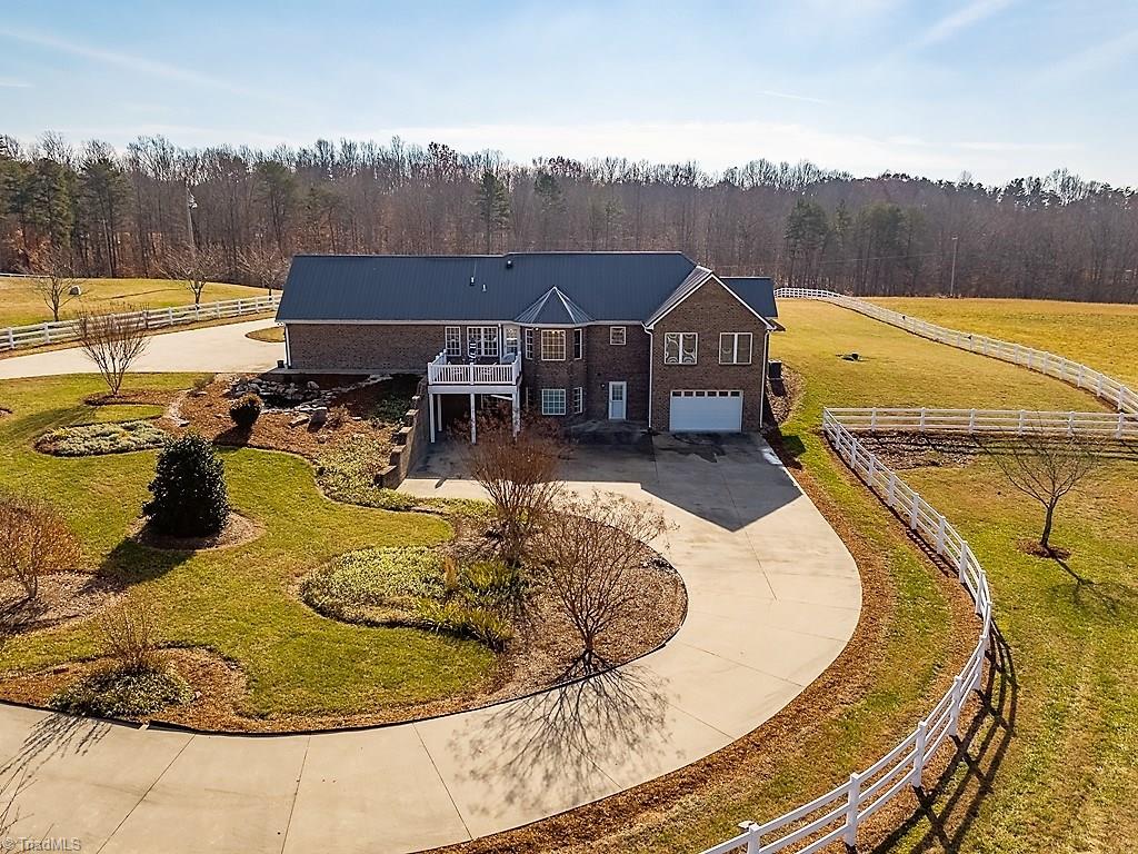 8315 Dennis Road Walnut Cove, NC 27052 - Photo 6 of 30 Beautiful Landscaping that Follows the Circle Drive All the Way to The Basement Entrance of the Home