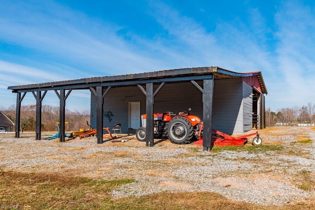 8315 Dennis Road Walnut Cove, NC 27052 - Photo 10 of 30 Additional Equipment Storage or Optional Run-in Shelter Under Awning off Main Barn