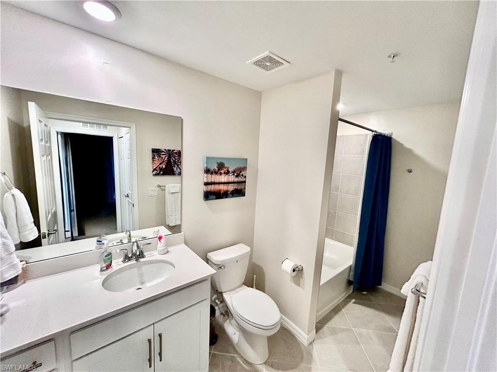43989 Boardwalk Loop, Unit 2024 Babcock Ranch, FL 33982 - Photo 13 of 18 a bathroom with a sink and a mirror