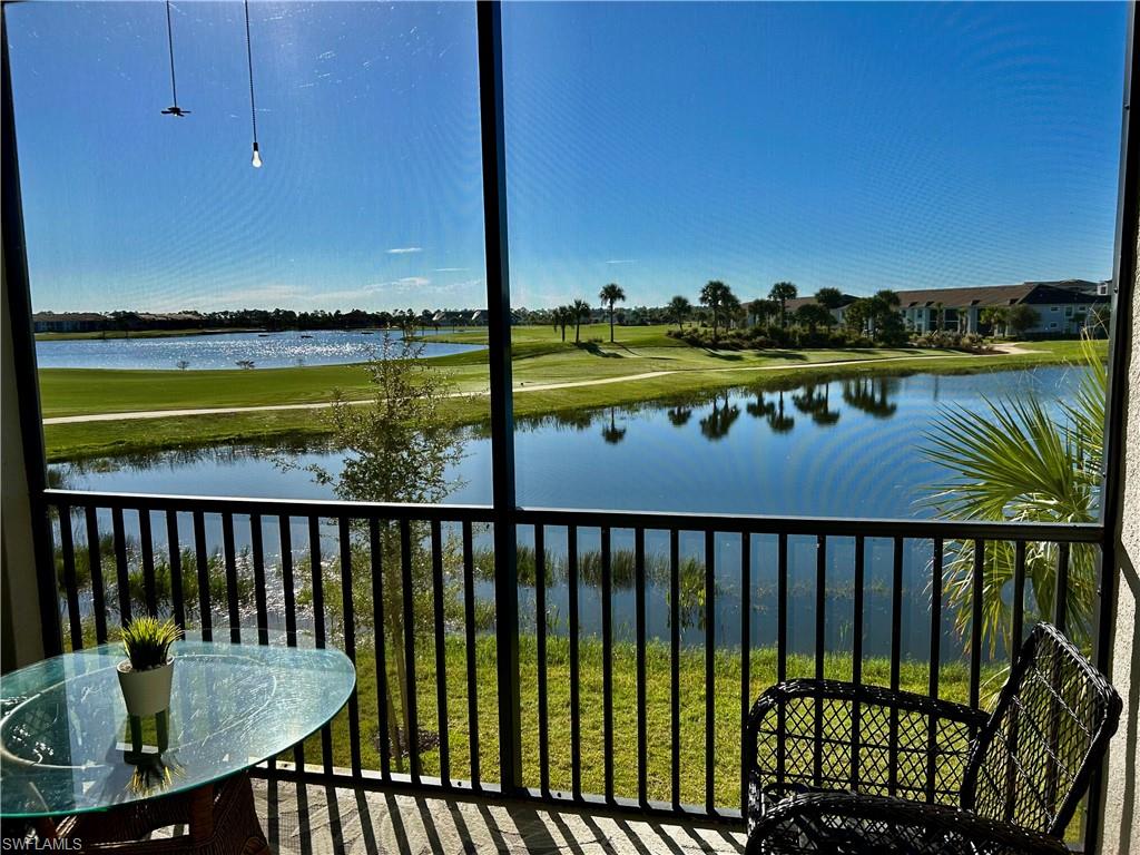 43989 Boardwalk Loop, Unit 2024 Babcock Ranch, FL 33982 - Photo 15 of 18 a view of a balcony with lake view