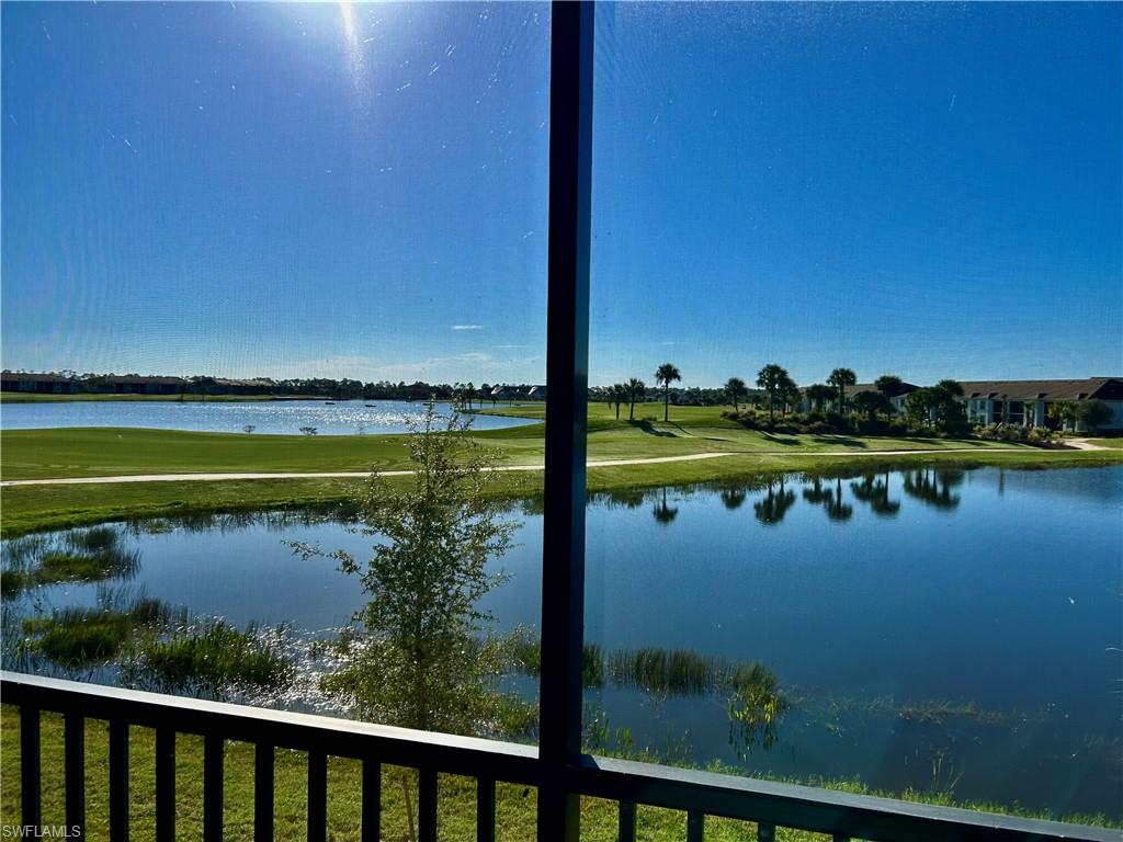 43989 Boardwalk Loop, Unit 2024 Babcock Ranch, FL 33982 - Photo 17 of 18 a view of a lake with a outdoor space
