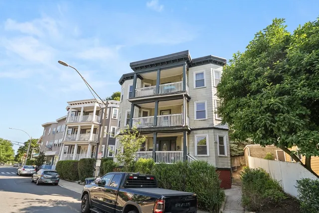 a front view of a building with street view