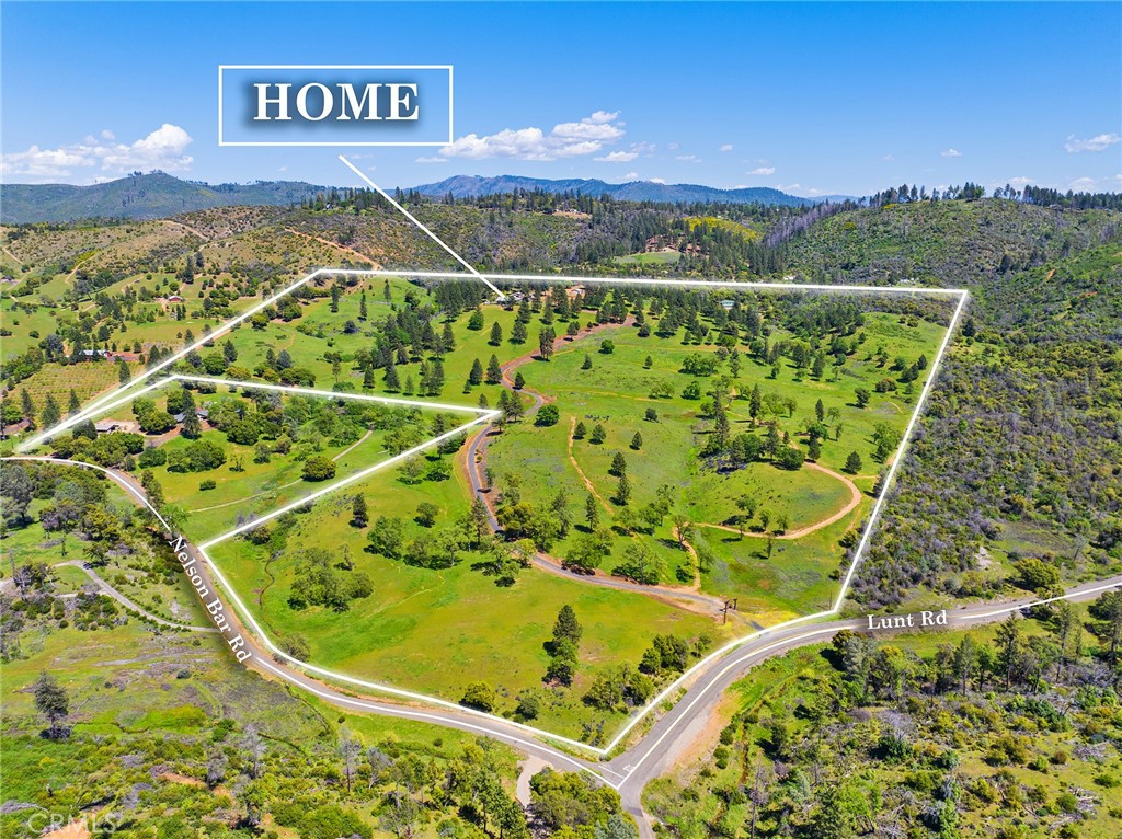 5735 Lunt Road Yankee Hill, CA 95965 - Photo 1 of 48 a view of a bathtub in a field