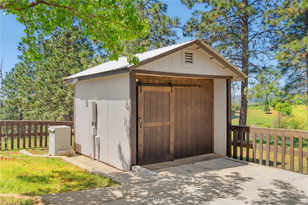 5735 Lunt Road Yankee Hill, CA 95965 - Photo 27 of 48 a front view of a house with a yard