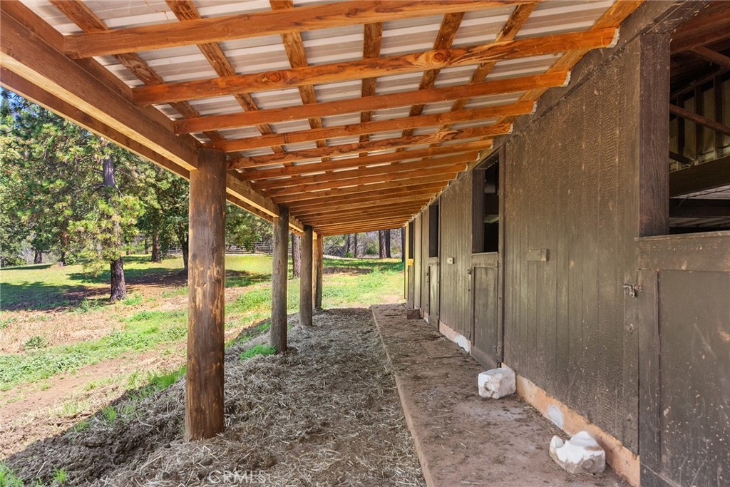 5735 Lunt Road Yankee Hill, CA 95965 - Photo 33 of 48 a view of a porch with a backyard