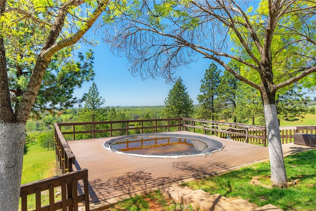 5735 Lunt Road Yankee Hill, CA 95965 - Photo 4 of 48 a view of a swimming pool with a patio