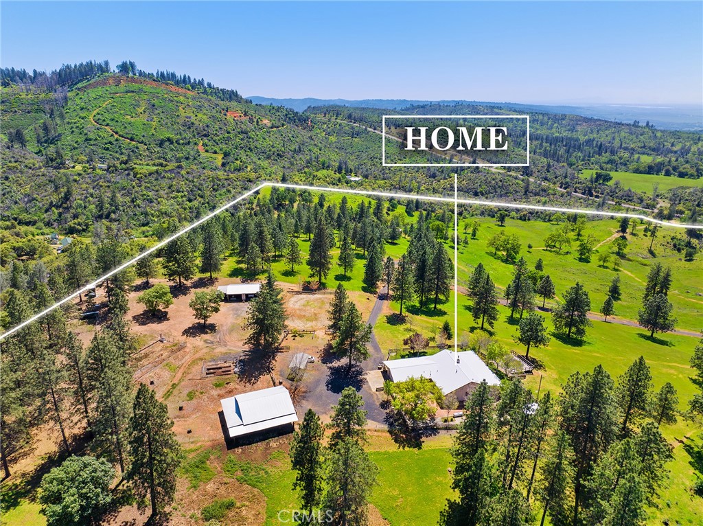 5735 Lunt Road Yankee Hill, CA 95965 - Photo 41 of 48 a view of a swimming pool with a yard and mountain view
