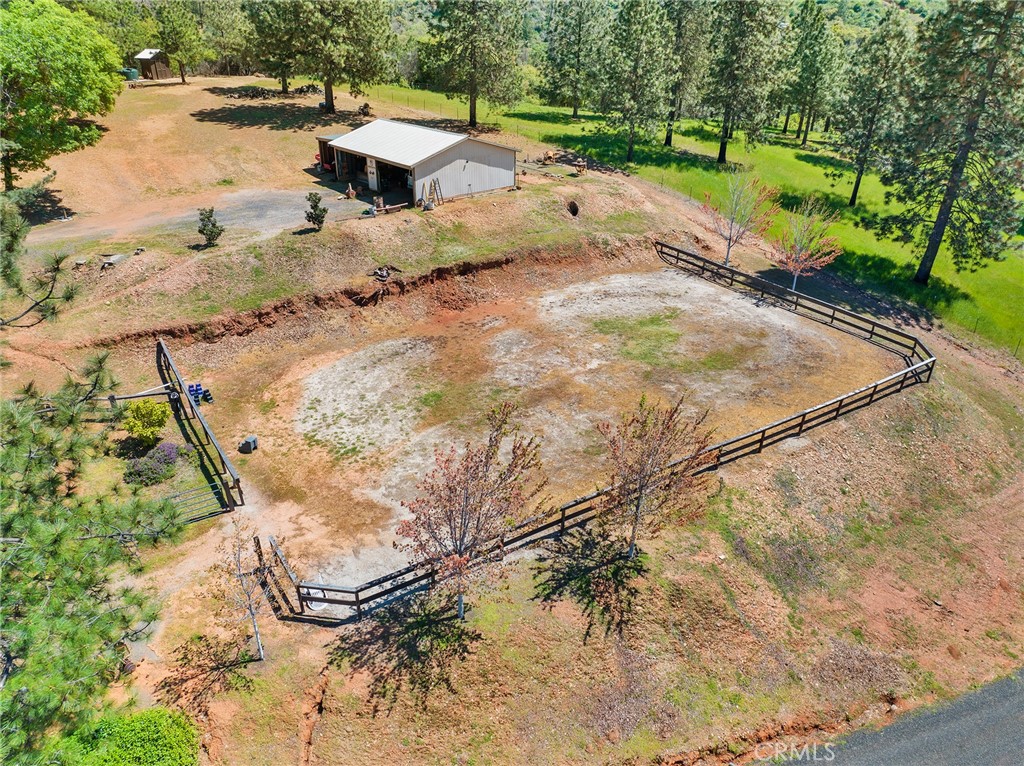 5735 Lunt Road Yankee Hill, CA 95965 - Photo 46 of 48 a backyard of a house with yard and outdoor seating