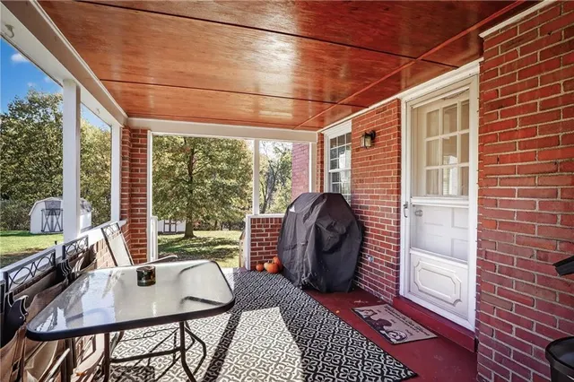 a room with furniture and a window