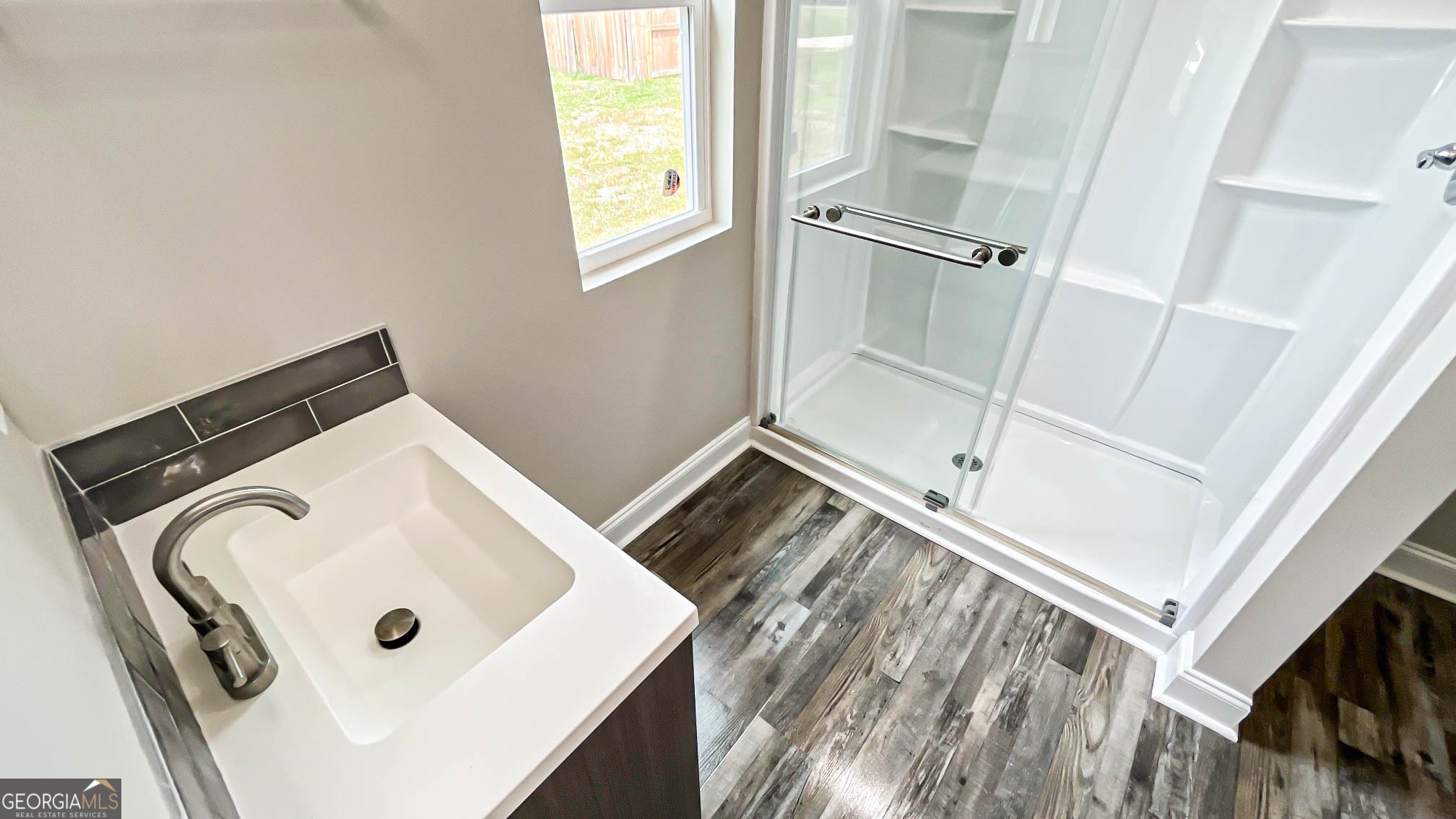 2011 Griffin Road Macon, GA 31216 - Photo 40 of 64 a bathroom with a sink and a mirror