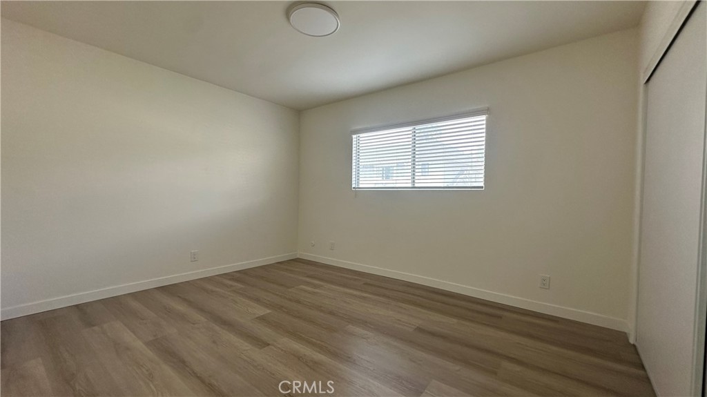 525 Howard Street, Unit F Alhambra, CA 91801 - Photo 3 of 8 an empty room with a window