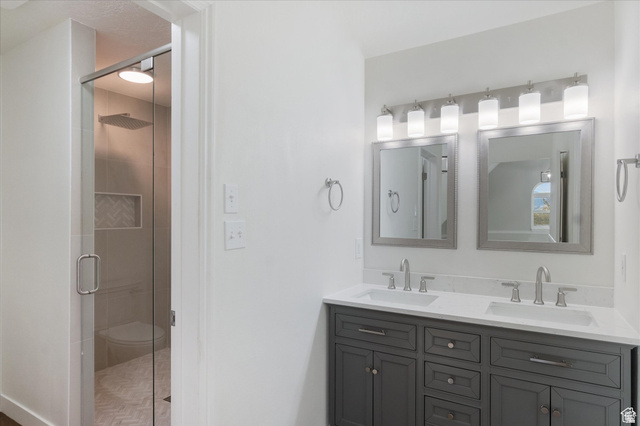 2078 Spring Oaks Drive Springville, UT 84663 - Photo 34 of 40 Bathroom featuring double vanity and a stall shower