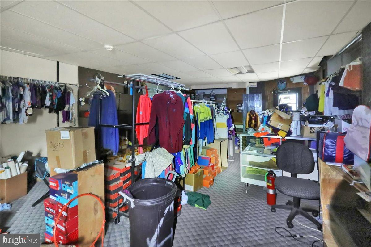 200 West Lancaster Avenue Reading, PA 19607 - Photo 21 of 50 Cluttered space brimming with vibrant apparel.