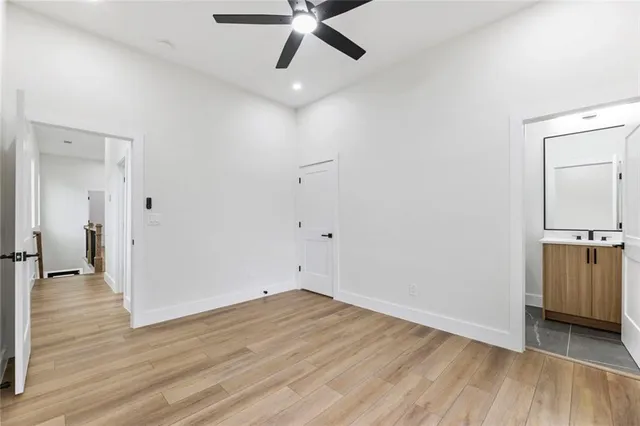 a view of a yard with a large tree