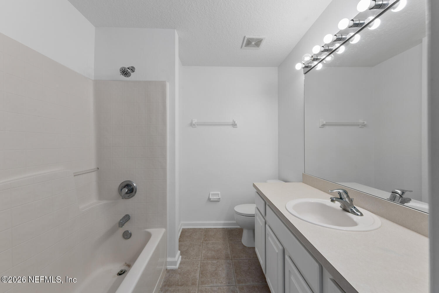 3532 Twisted Tree Lane Jacksonville, FL 32216 - Photo 14 of 23 a bathroom with a sink a toilet and shower