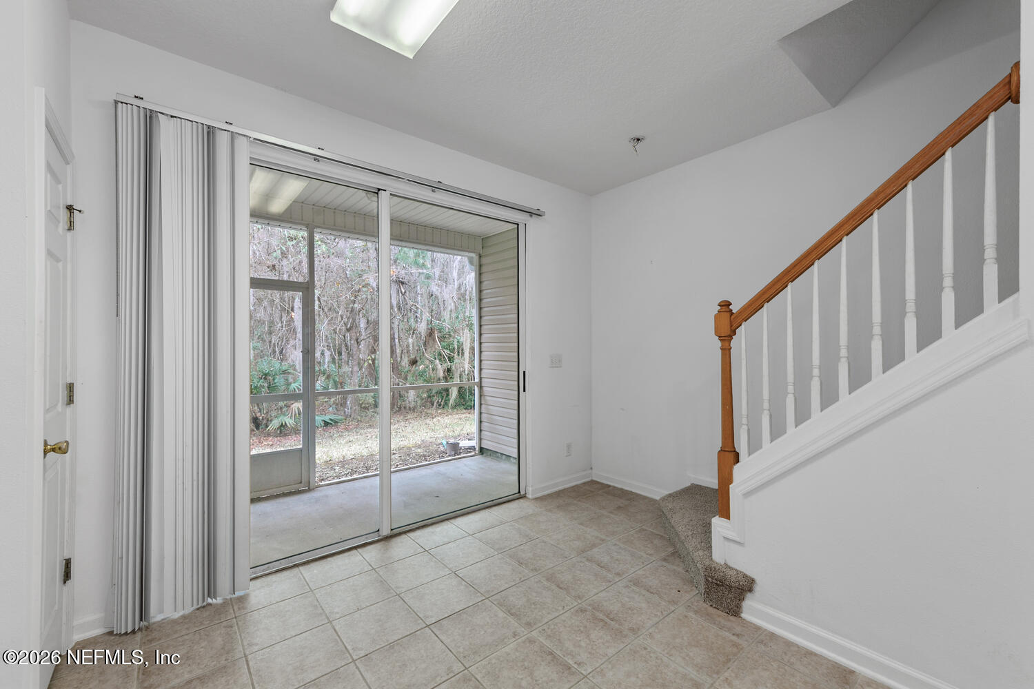 3532 Twisted Tree Lane Jacksonville, FL 32216 - Photo 5 of 23 a view of an empty room with glass door