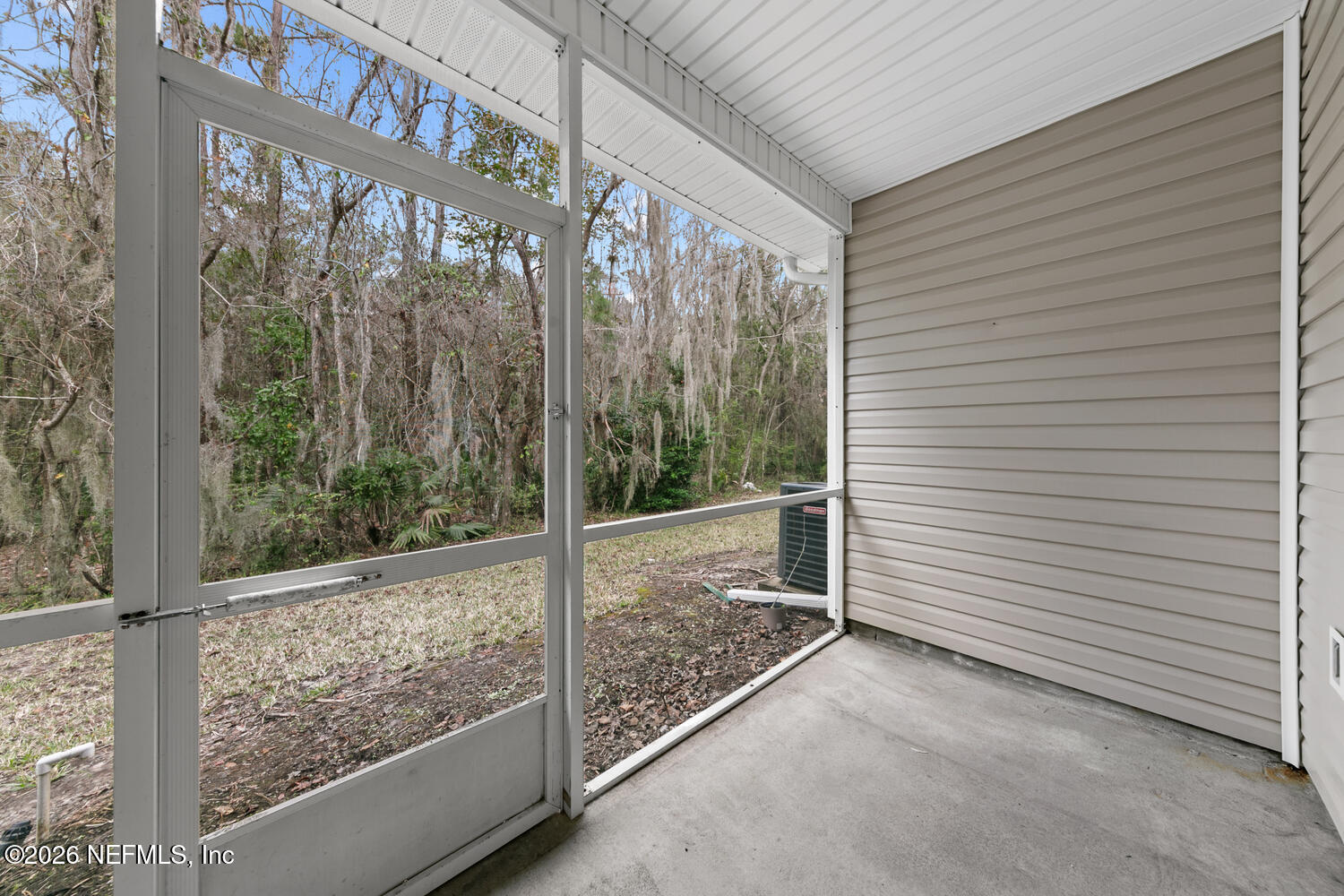3532 Twisted Tree Lane Jacksonville, FL 32216 - Photo 9 of 23 a view of a room with a large window