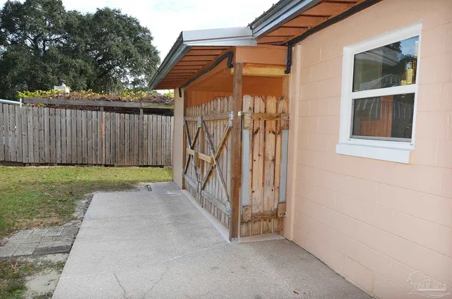 an aerial view of a house with swimming pool