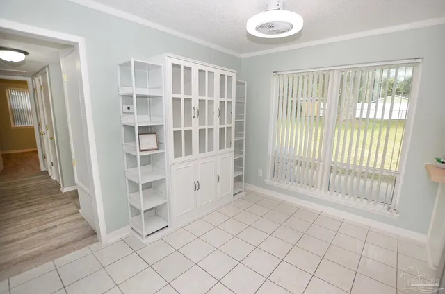 a view of an empty room and window