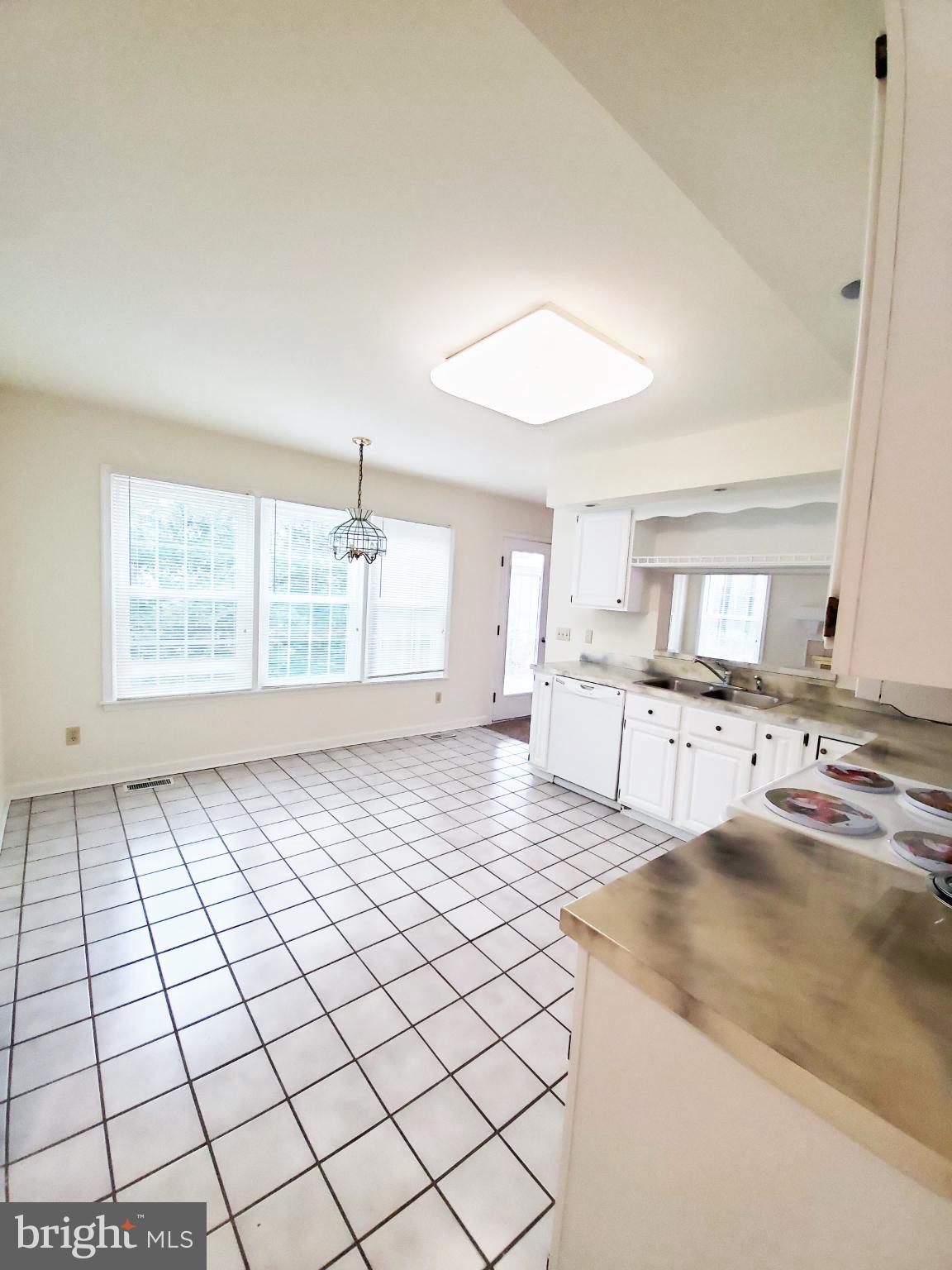 311 A Union Avenue, Unit A Salisbury, MD 21801 - Photo 14 of 38 a view of an empty room and window