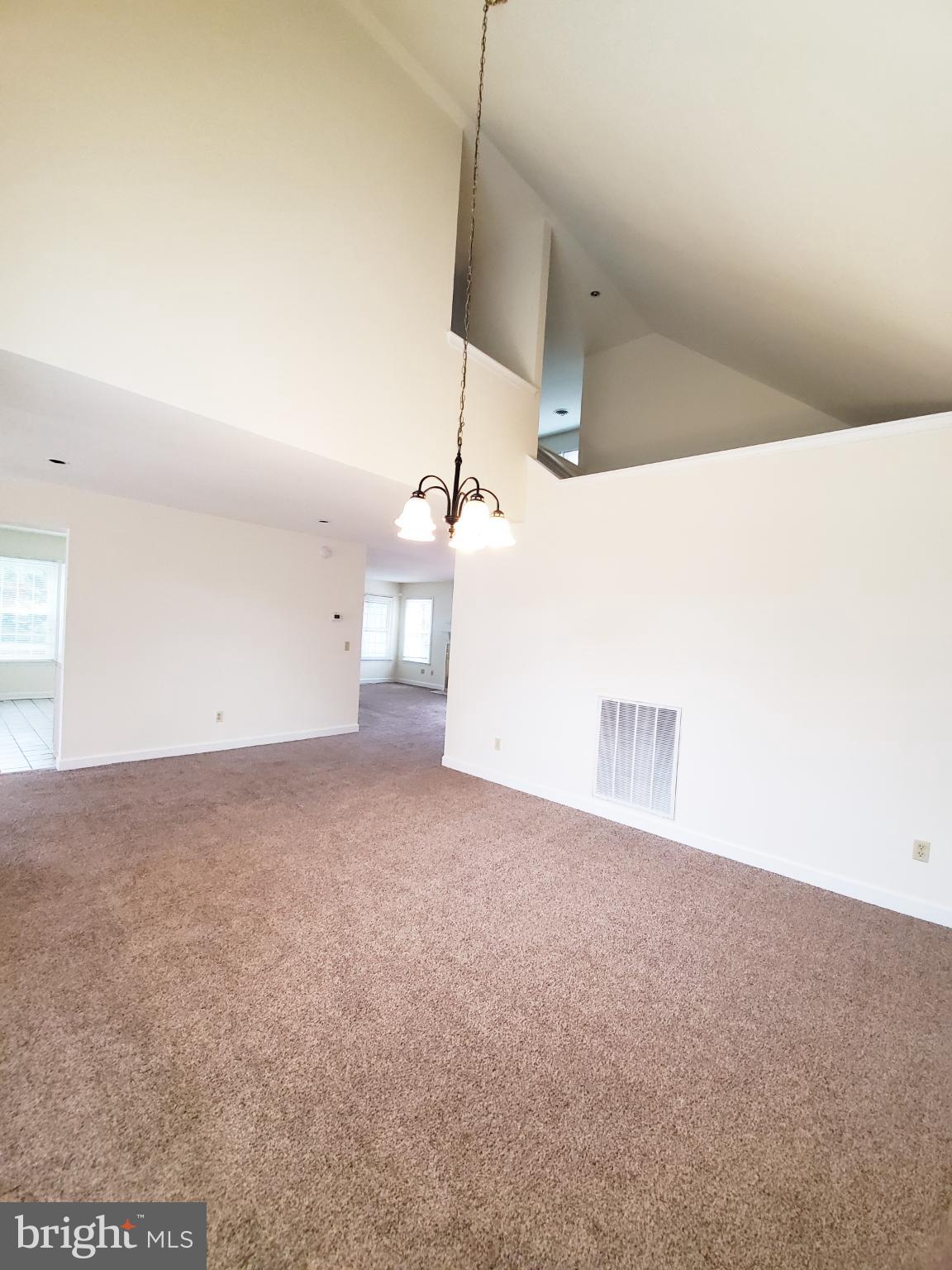 311 A Union Avenue, Unit A Salisbury, MD 21801 - Photo 16 of 38 a view of a room with a ceiling fan