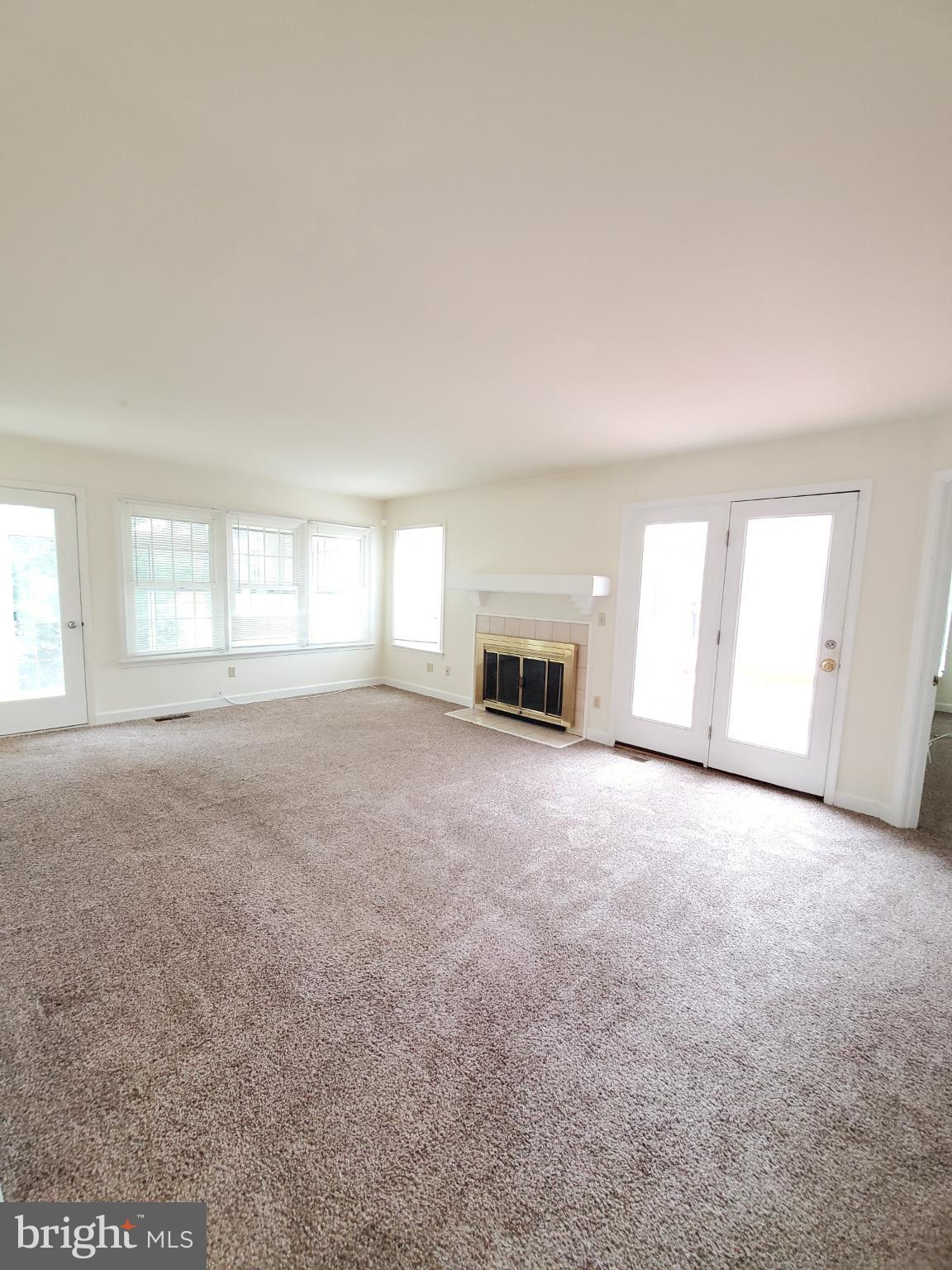 311 A Union Avenue, Unit A Salisbury, MD 21801 - Photo 18 of 38 a view of livingroom with window and fireplace