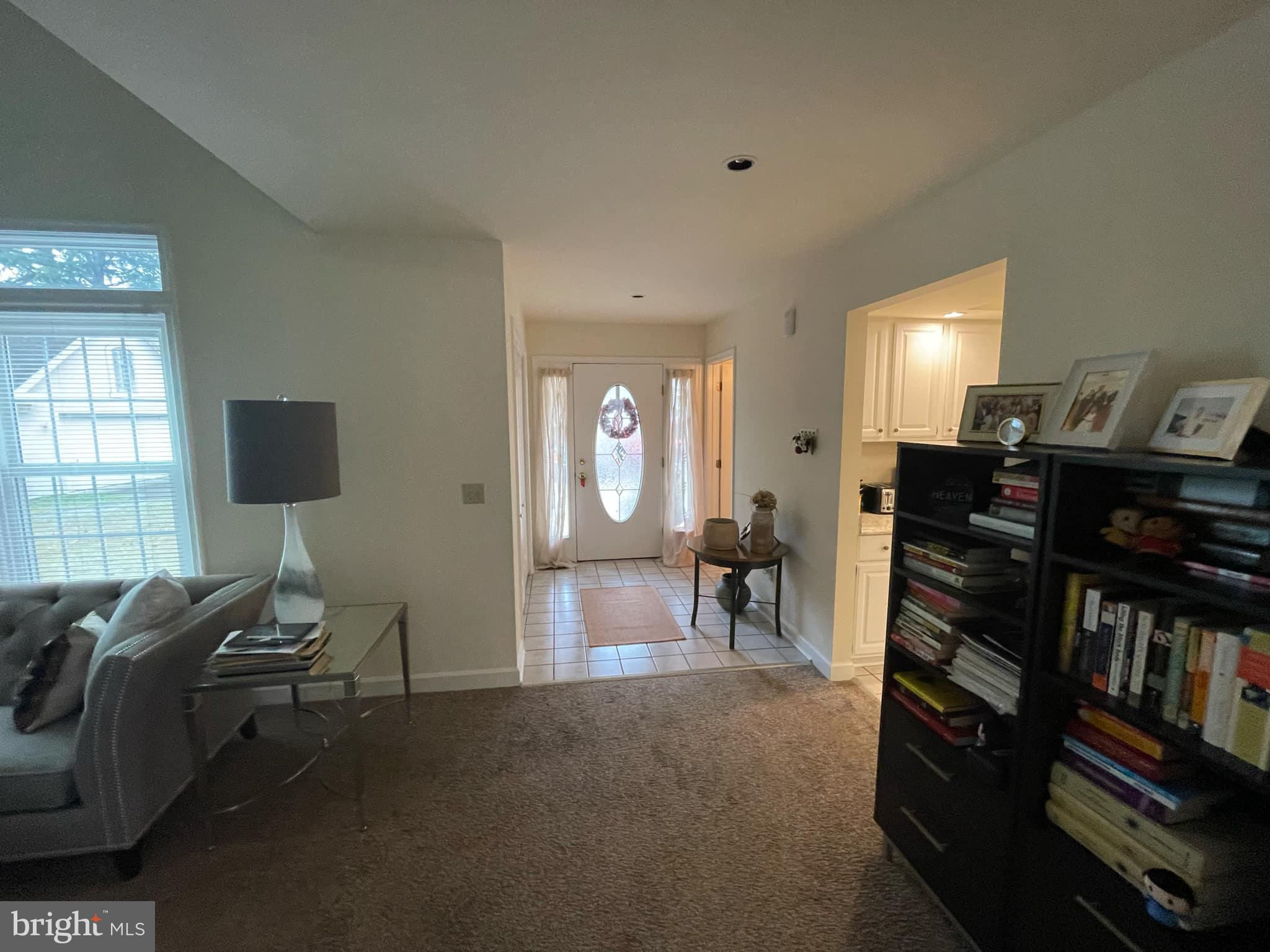311 A Union Avenue, Unit A Salisbury, MD 21801 - Photo 2 of 38 a view of a livingroom with furniture and a window